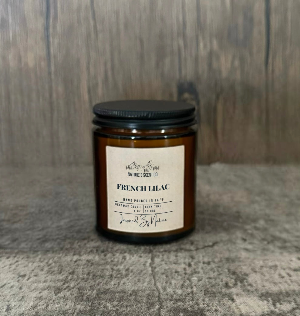 Hand-poured beeswax candle with a fresh lilac fragrance, bringing the essence of spring indoors