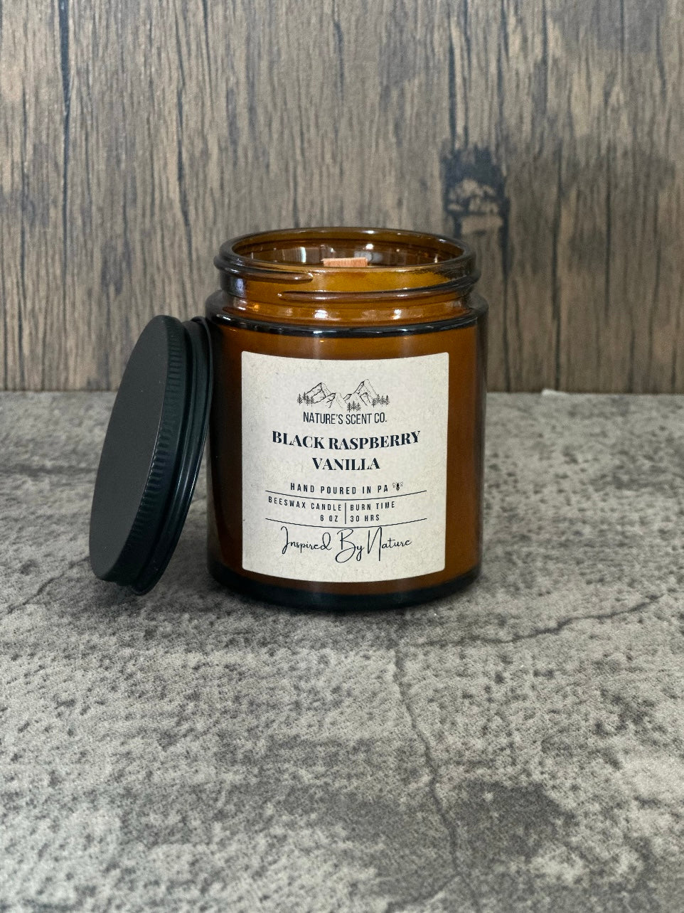 Nature's Scent Co Black Raspberry candle, all-natural beeswax with a wood wick in an amber glass jar for a juicy, berry-filled aroma