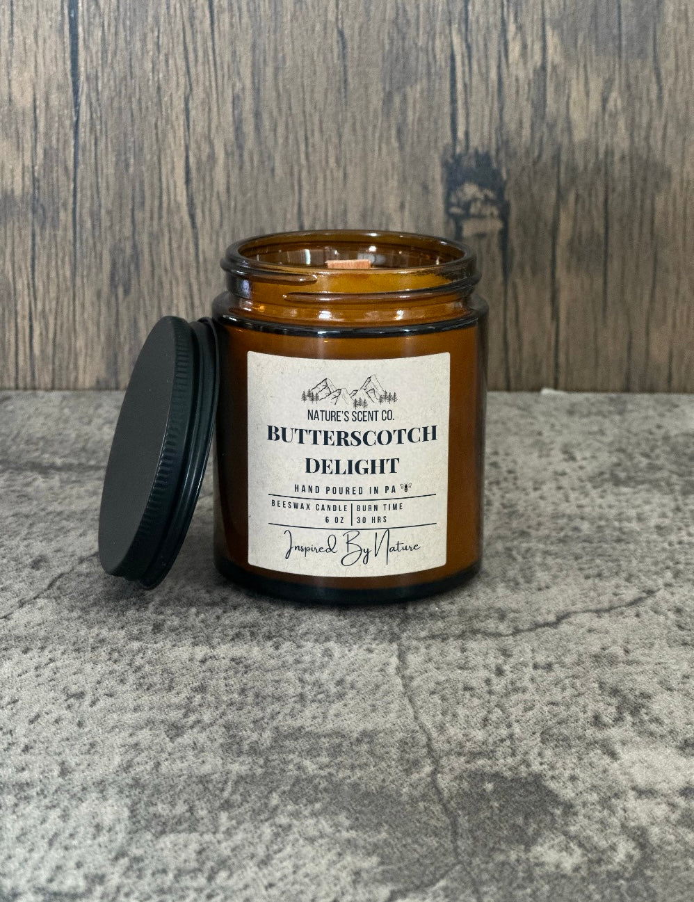 Warm and creamy Butterscotch Delight beeswax candle in an amber jar, perfect for a cozy and sweet atmosphere